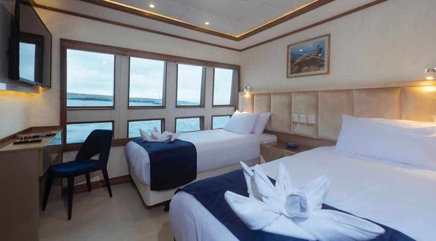 double bed bedroom of tiburon explorer yacht of galapagos islands