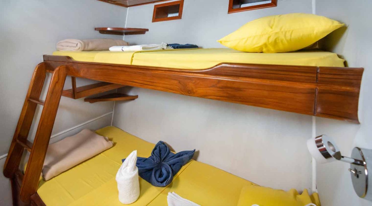 double bed bedroom of aida maria yacht of galapagos islands