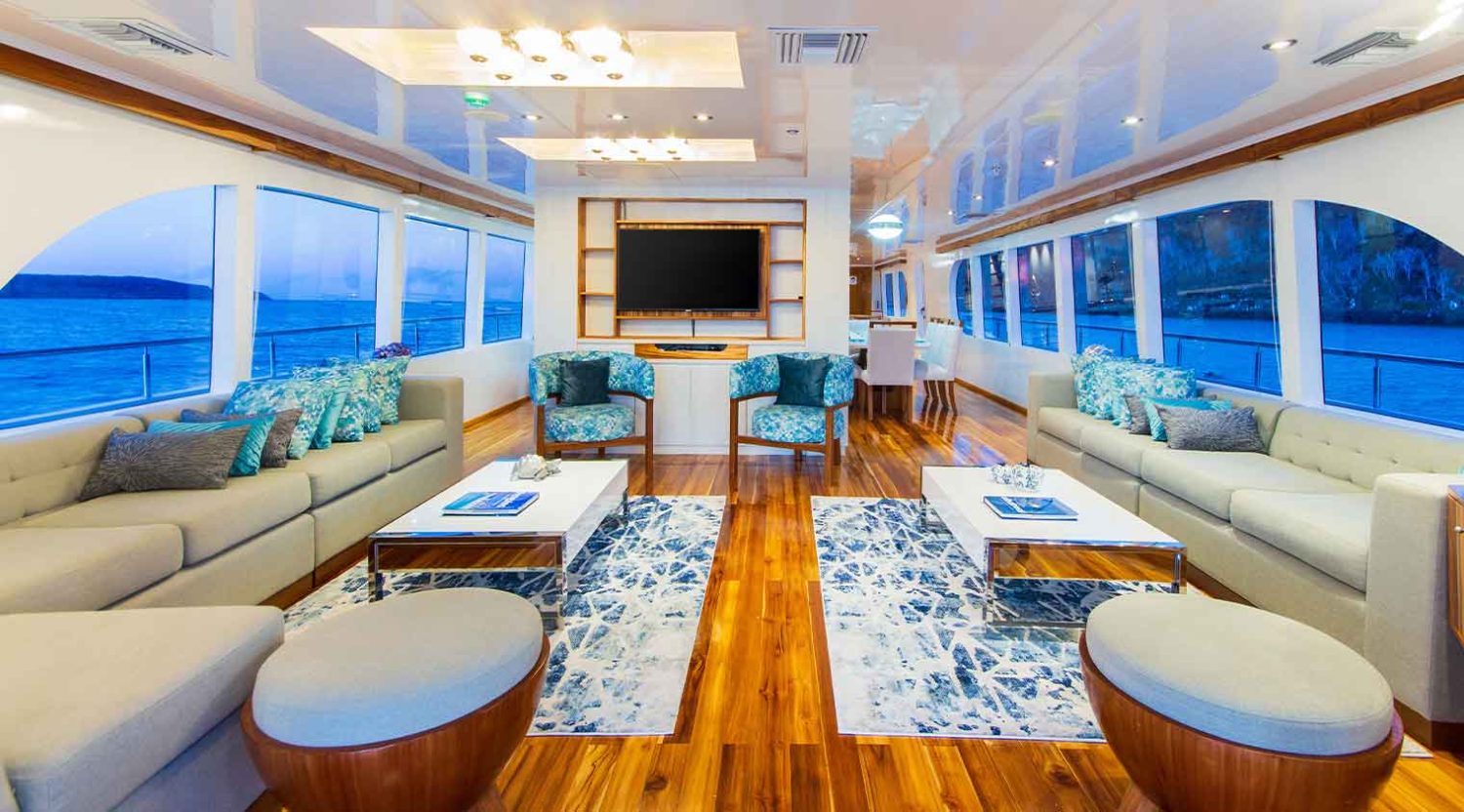 Grand Daphne Yacht interior living room of galapagos islands tours
