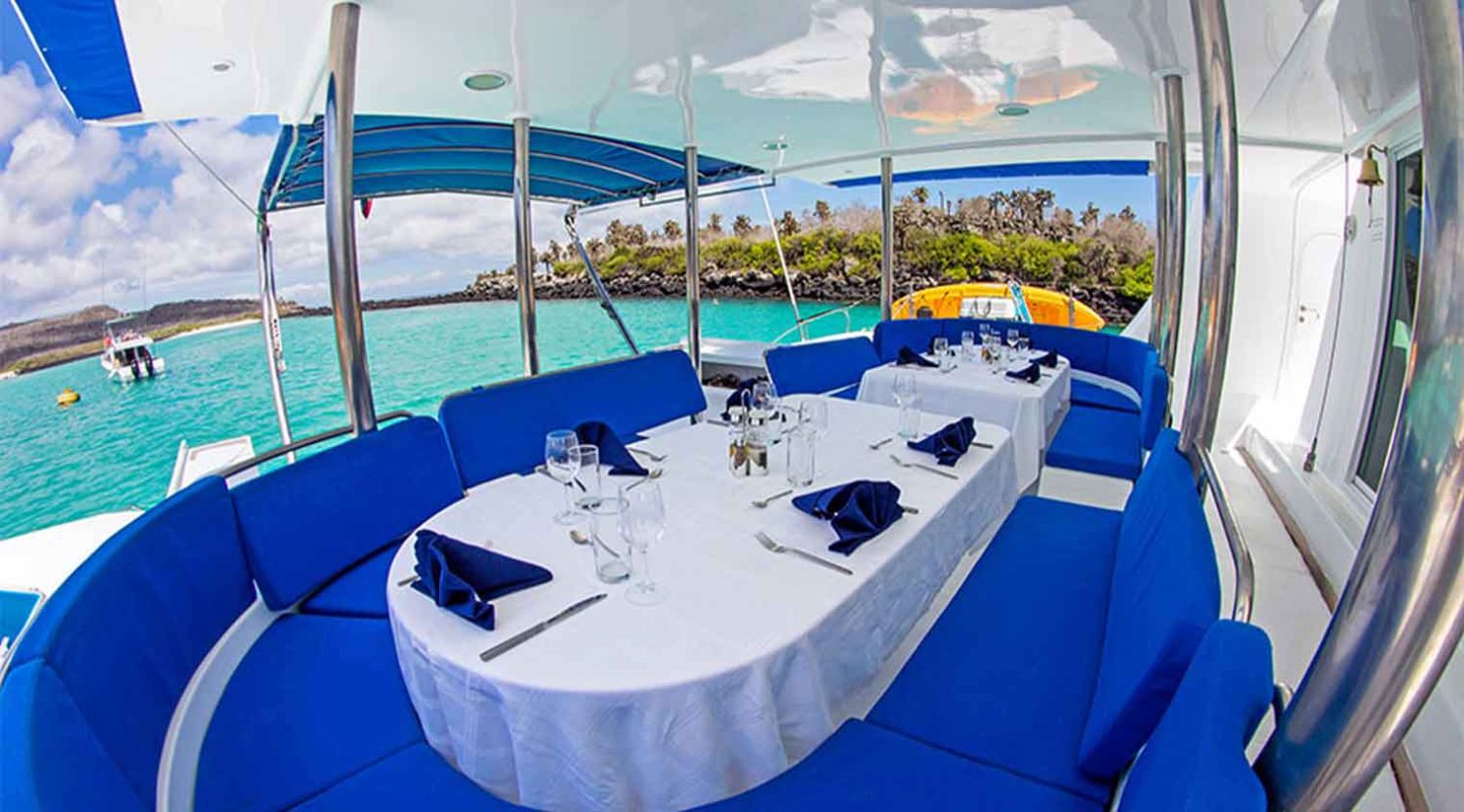 outdoor dining room of nemo 1 yacht of galapagos islands