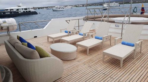 outdoor living room of tiburon explorer yacht of galapagos islands