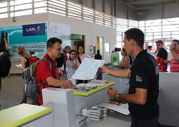 arriving to galapagos airport getting information of galapagos islands tours