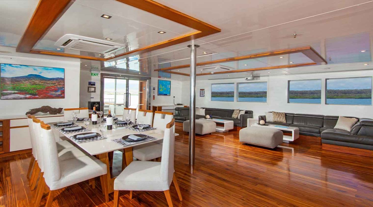 infinity yacht dining and living room of galapagos islands tours