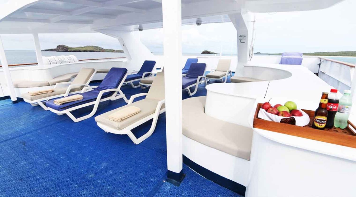 millenium catamaran yacht top deck of galapagos islands tours