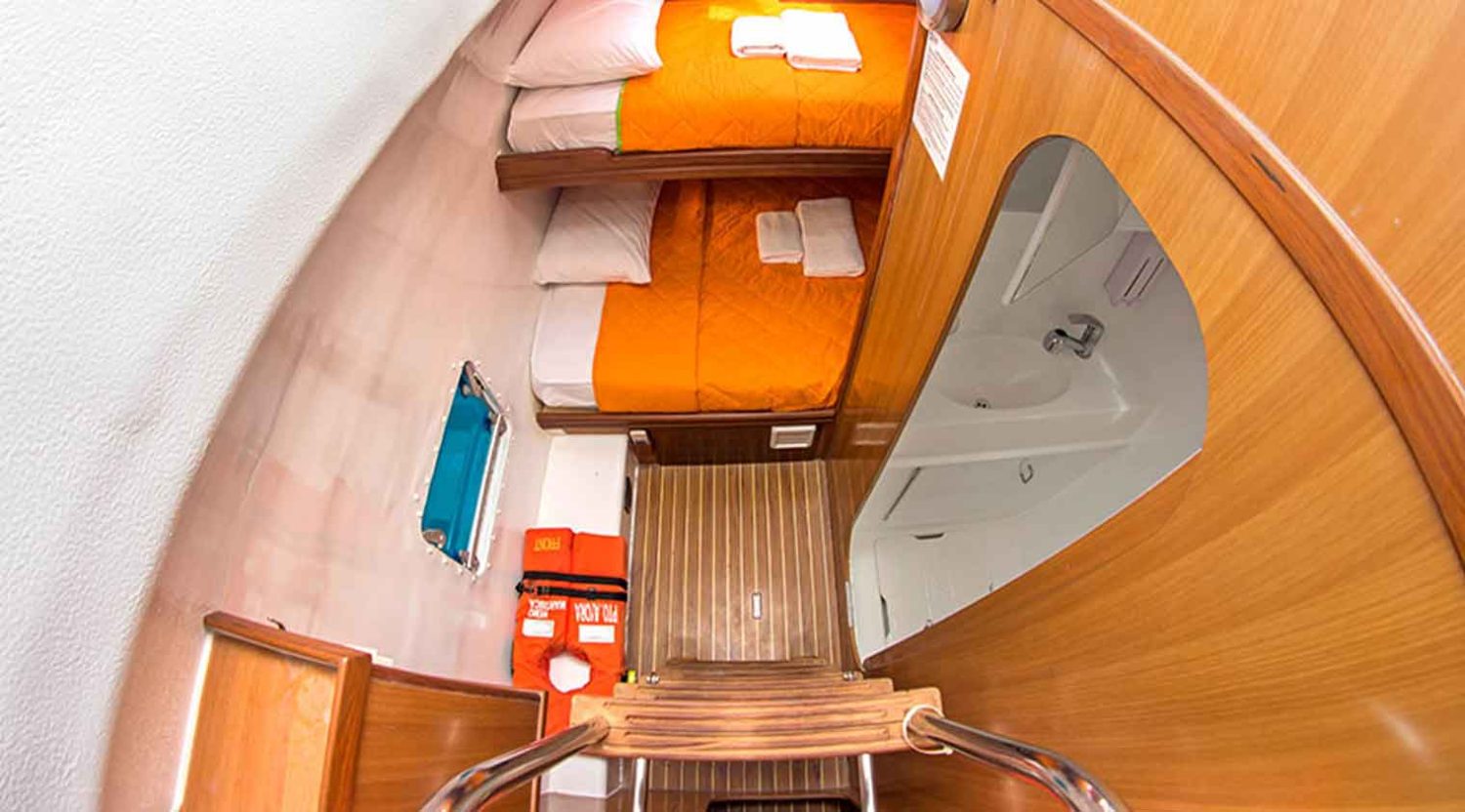 top view of nemo yacht double bed bedroom with bathroom galapagos islands