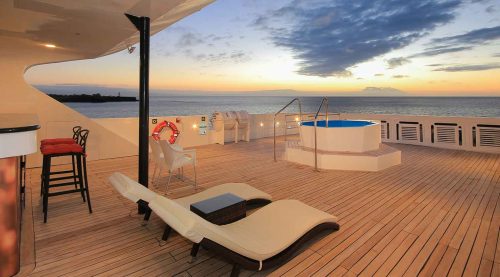 top deck with yacuzzi of grand queen beatriz yacht of galapagos islands tours
